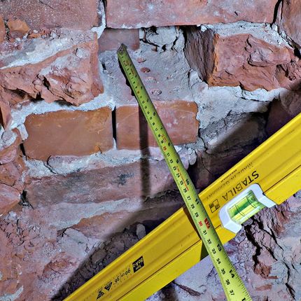 measuring and preparing reports for defects of brick walls