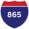 A blue and red highway sign with the number 865 on it
