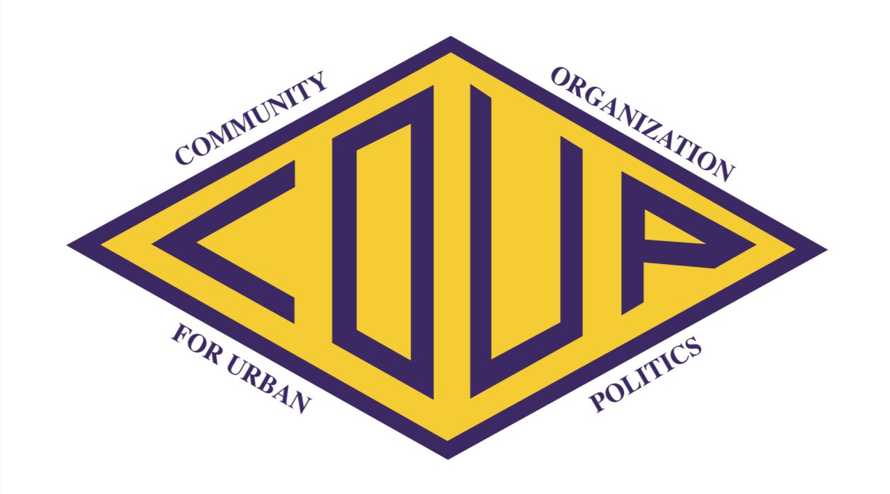A yellow diamond logo with a thick purple border, featuring the text 