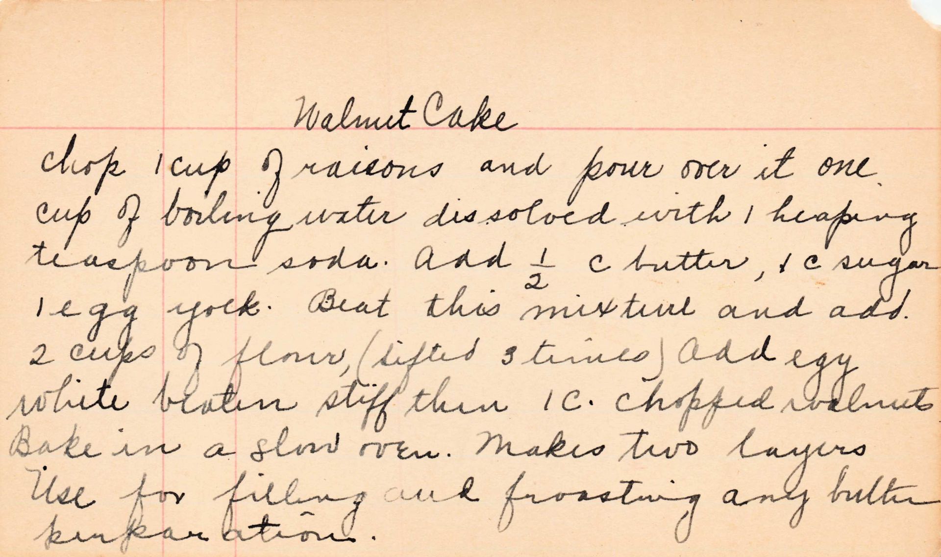 Handwritten recipe for walnut cake on a lined index card.