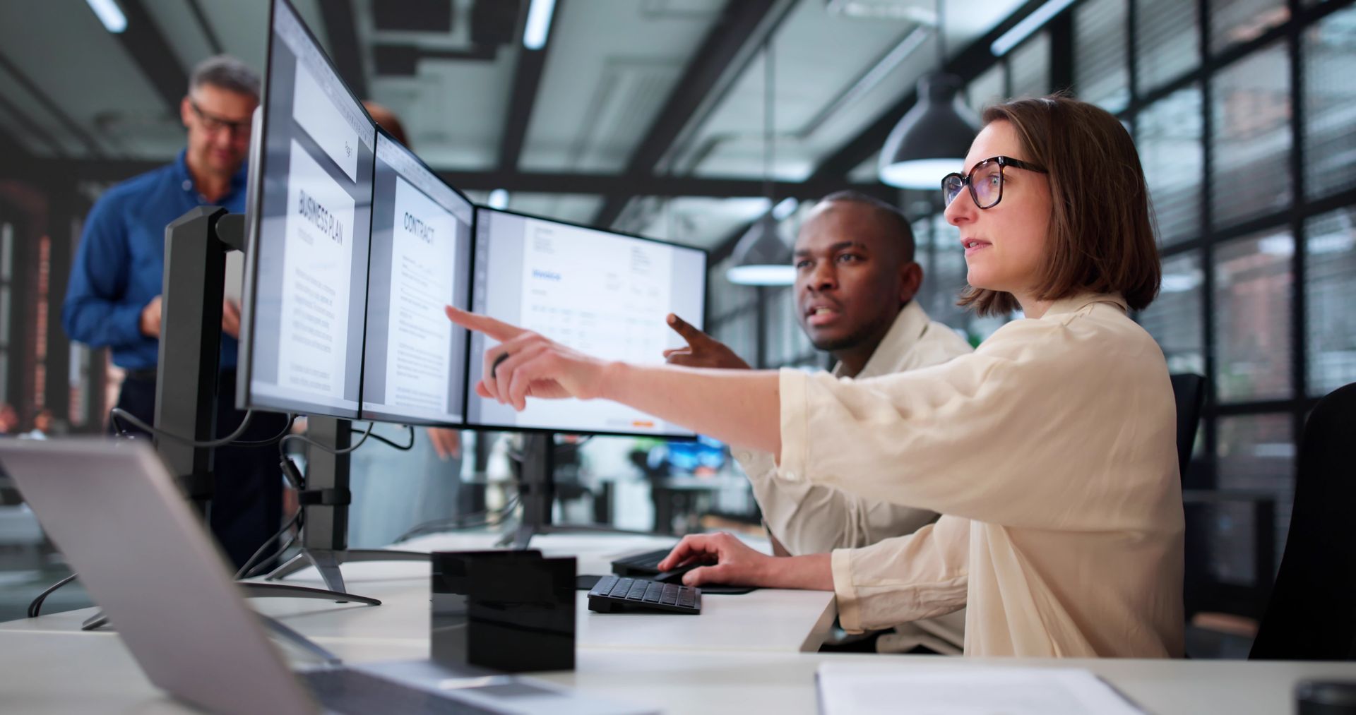 A network rack with patch panels, switches, and bundled network cables.