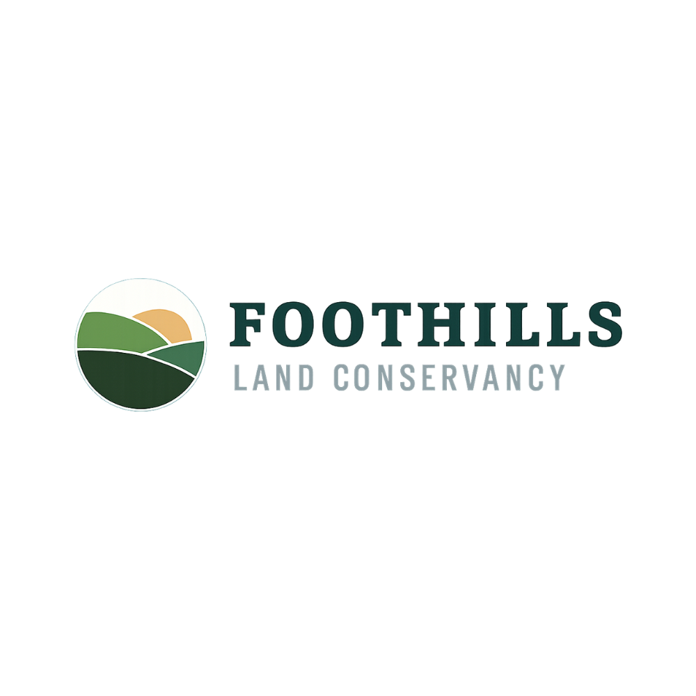 Logo of Foothills Land Conservancy: green and orange landscape inside a circle, text 
