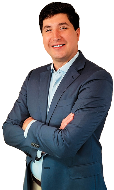 A man in a suit and tie is smiling for the camera.