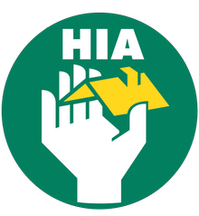 Green circle with white hand holding a yellow roof. HIA in white at the top.
