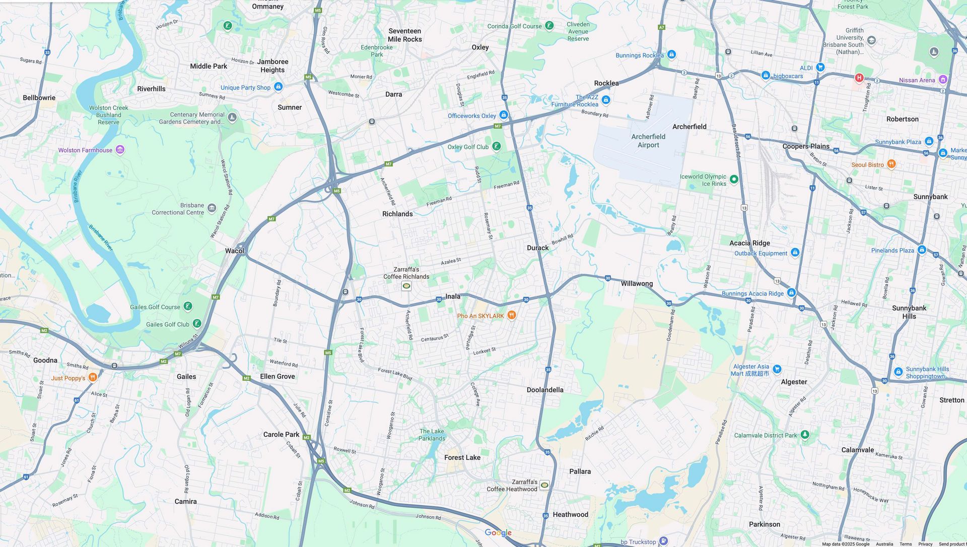 A map showing a network of roads, bodies of water, and green areas within a suburban landscape.