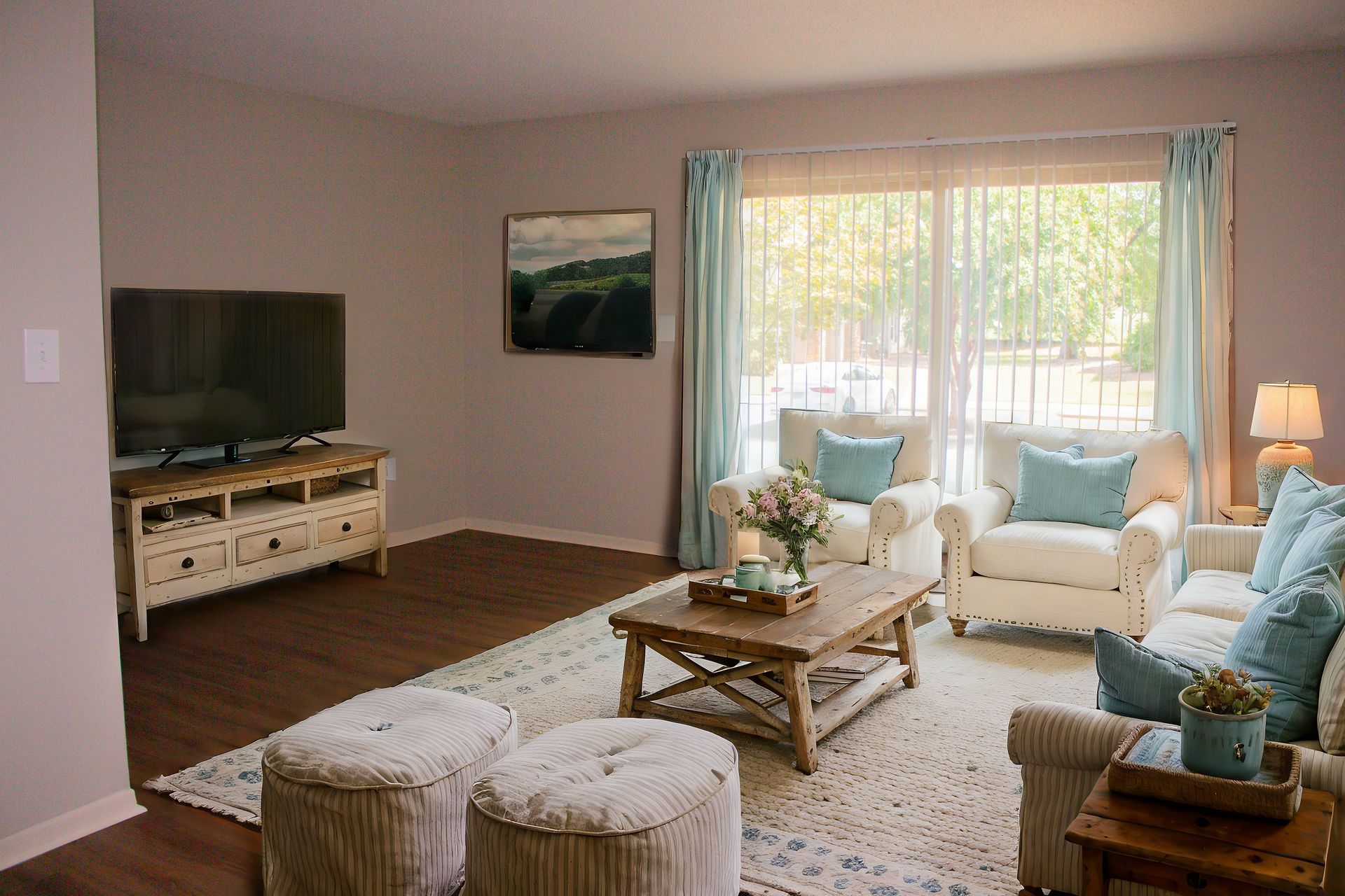 A living room filled with furniture and a flat screen tv.
