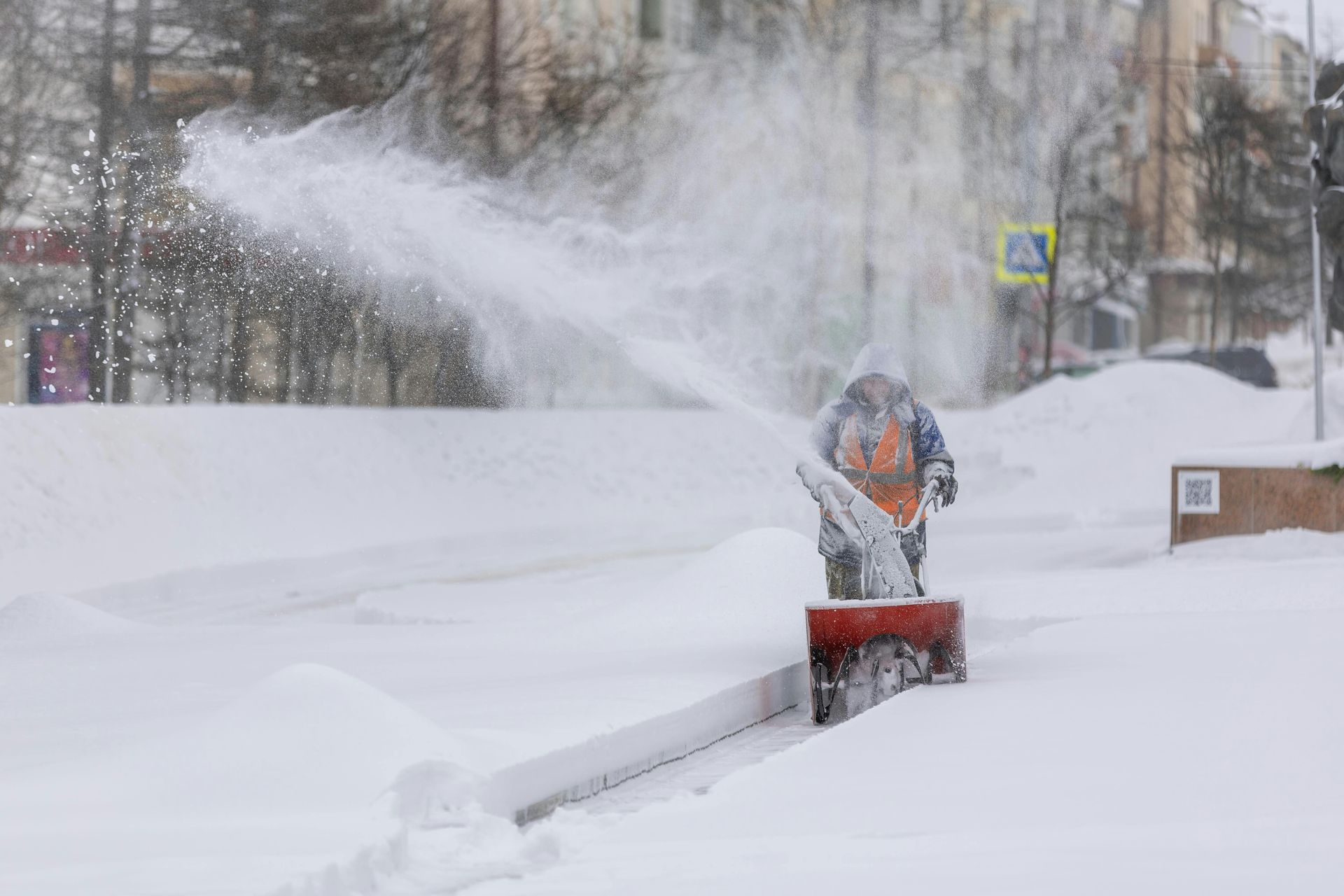 Person Snow Blowing