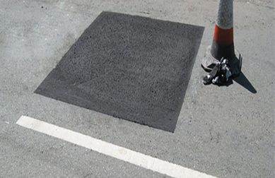 completed pothole repair