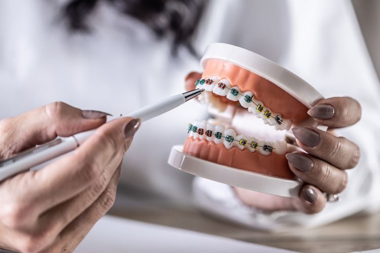 Pen With Braces — Leeton, NSW — Leeton Orthodontics