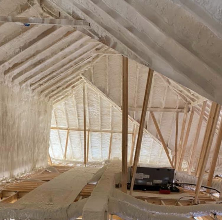 Attic Insulation with wooden beams.