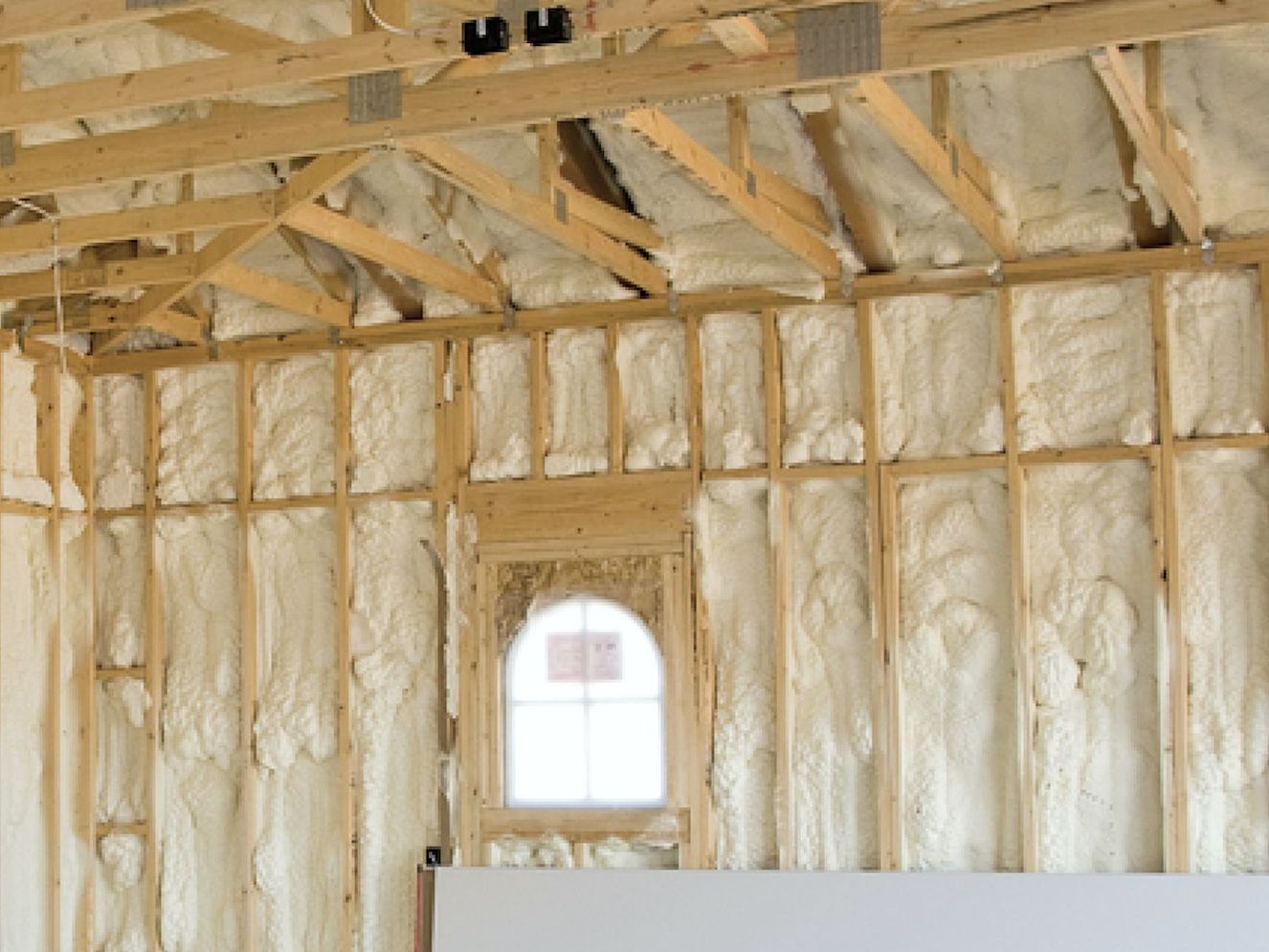 Finished House with Open Spray Foam Insulation.