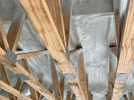 Crawl space insulated with spray foam