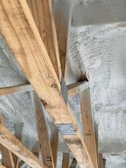 Spray foam insulation applied in crawl space