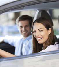Man and Woman on Car - Insurance Deal in Greenville, OH