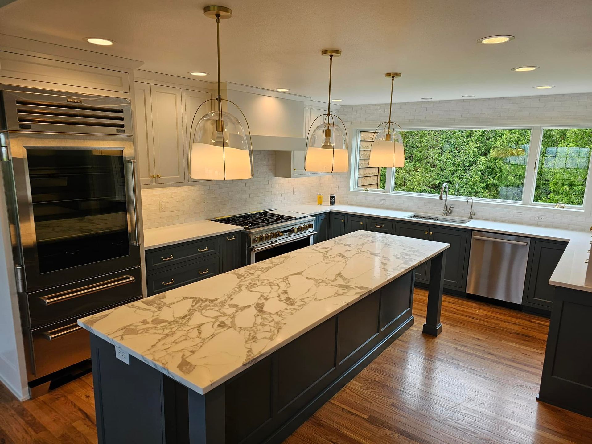 newly remodeled kitchen with new island and cabinets