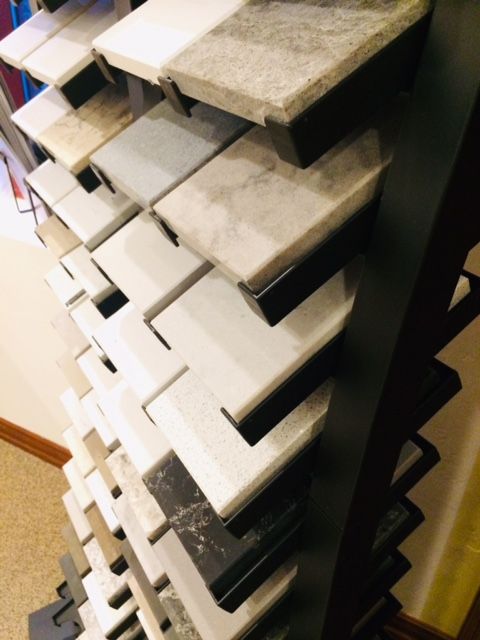 A display of marble counter tops in a store