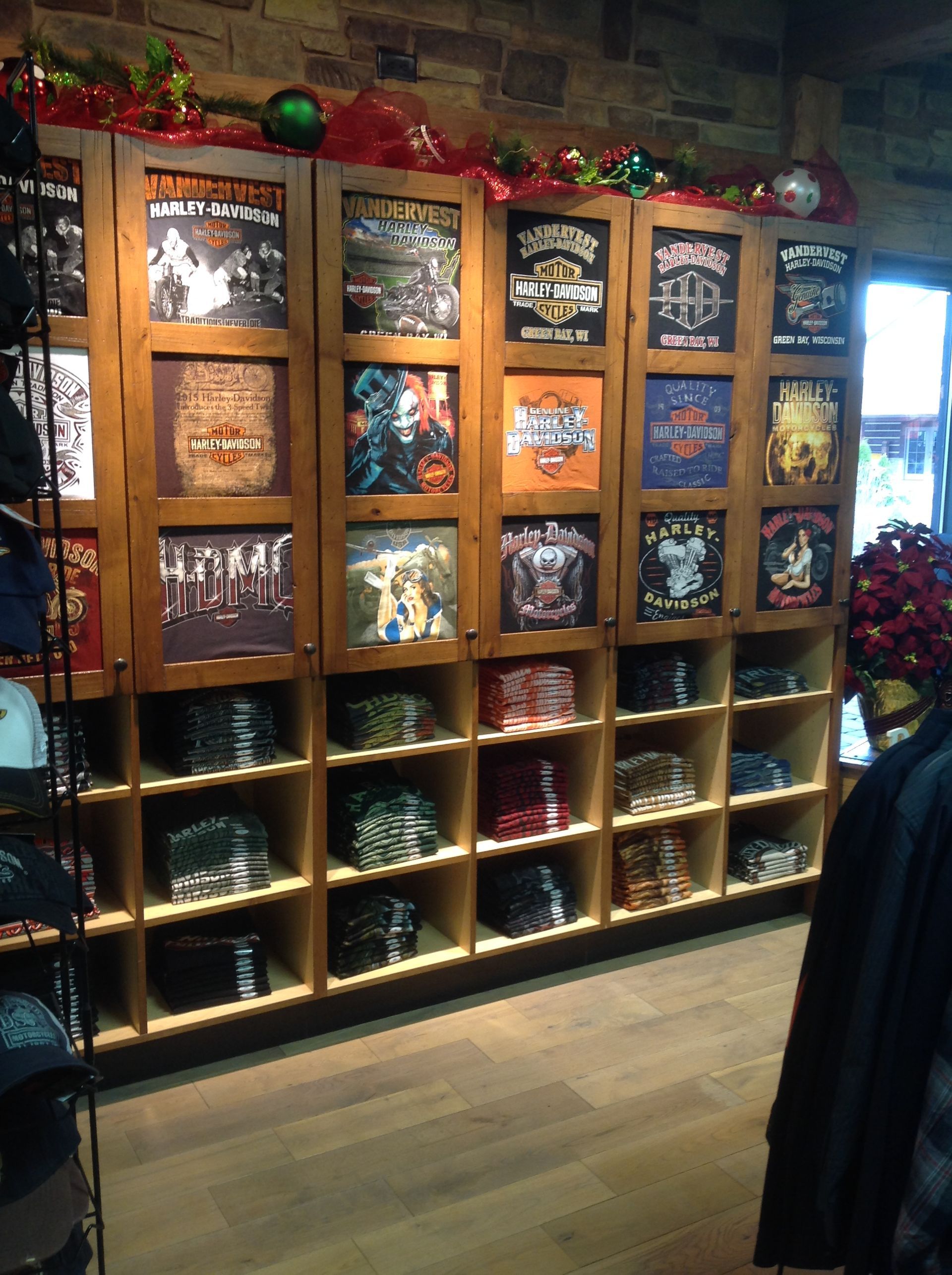 A store with a lot of shirts on the shelves