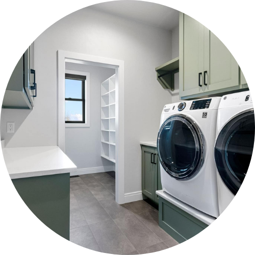 A laundry room with a washer and dryer in a circle.