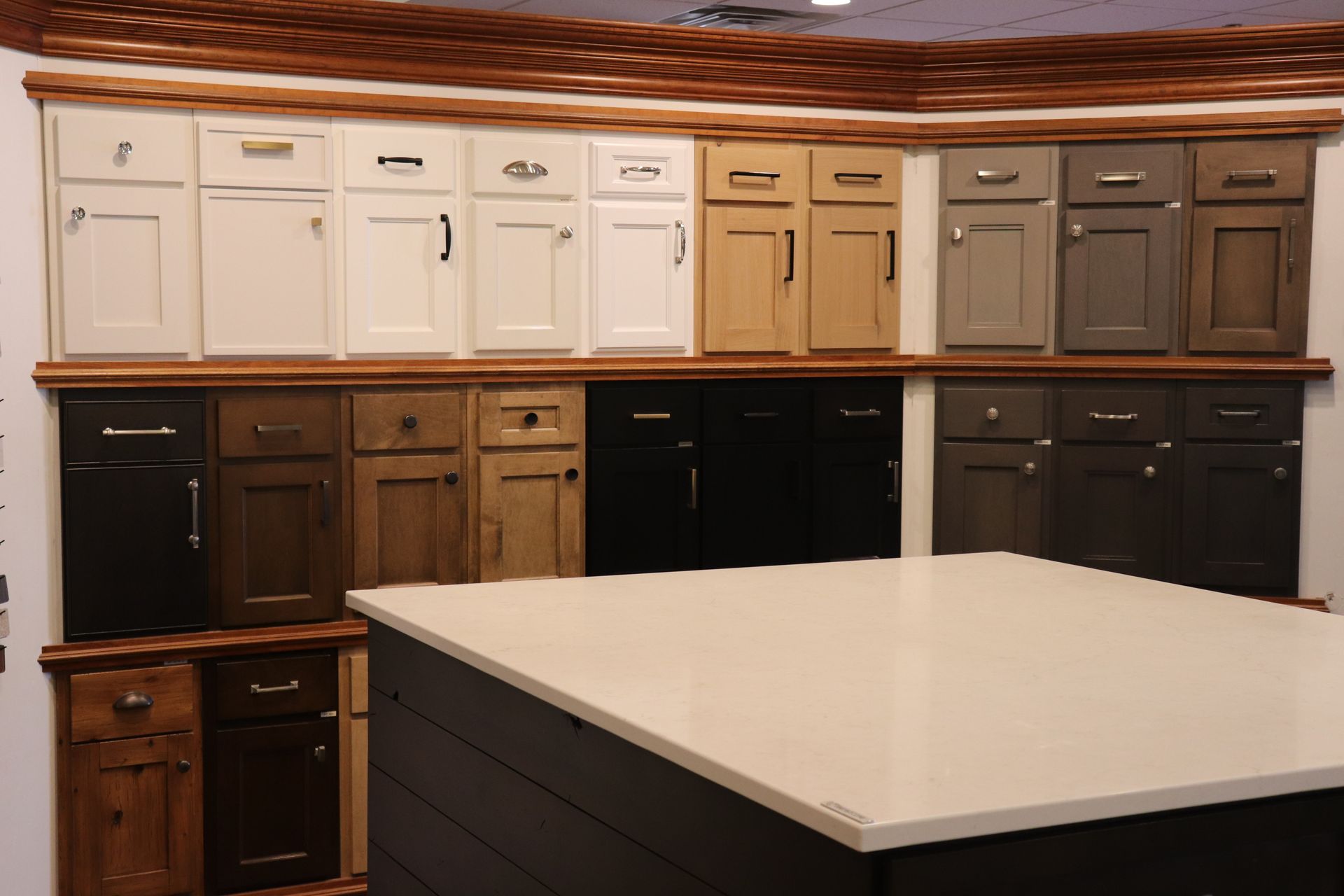 A kitchen with a lot of cabinets and drawers