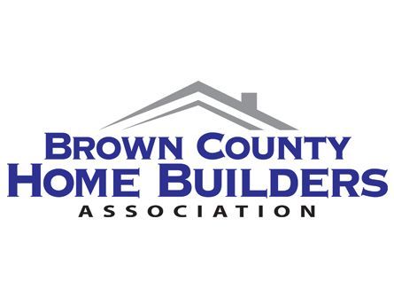 The brown county home builders association logo is a house with a chimney on the roof.
