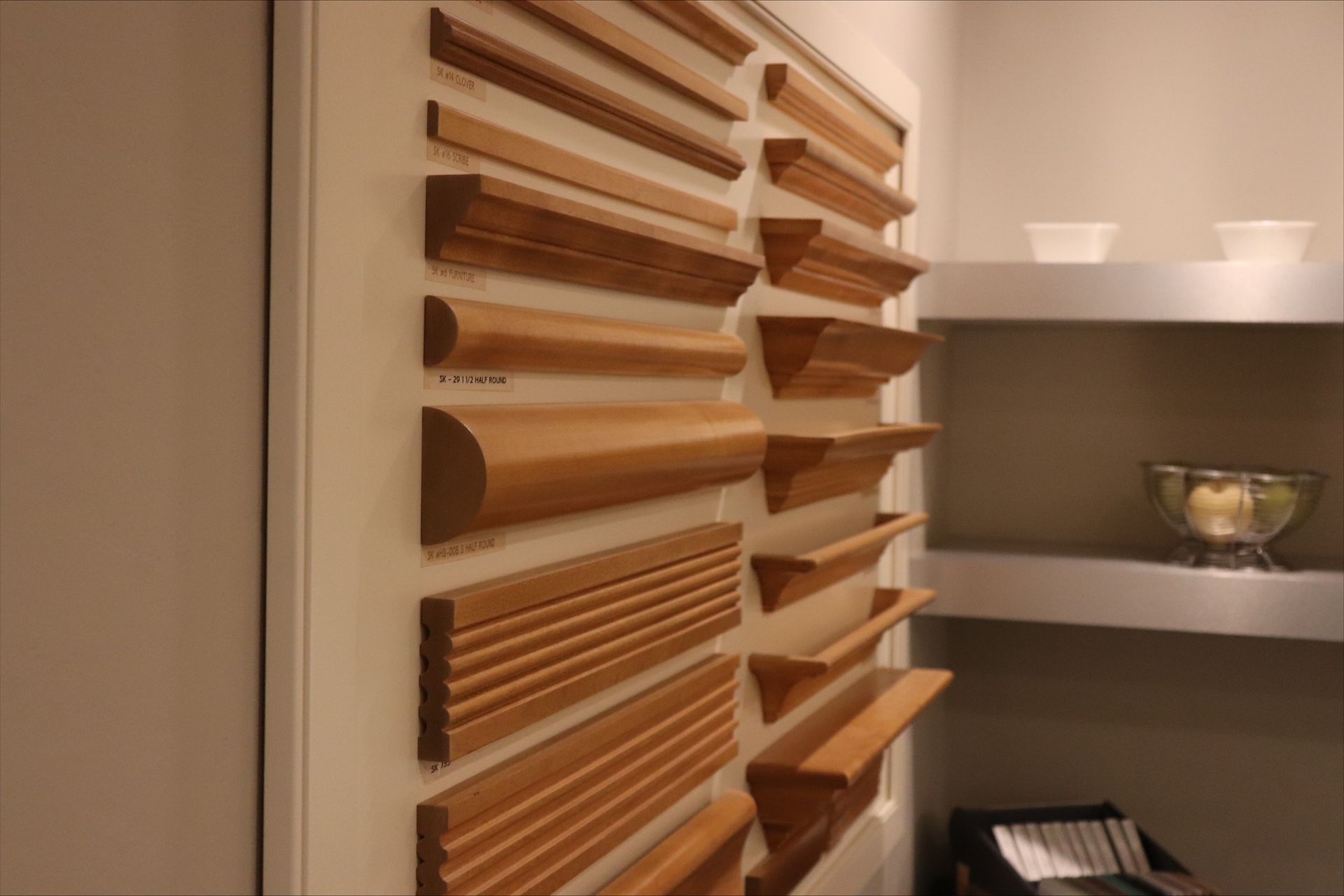 A wall with a bunch of wooden molding on it