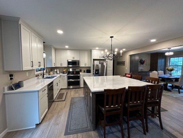 remodeled kitchen with white cabinets