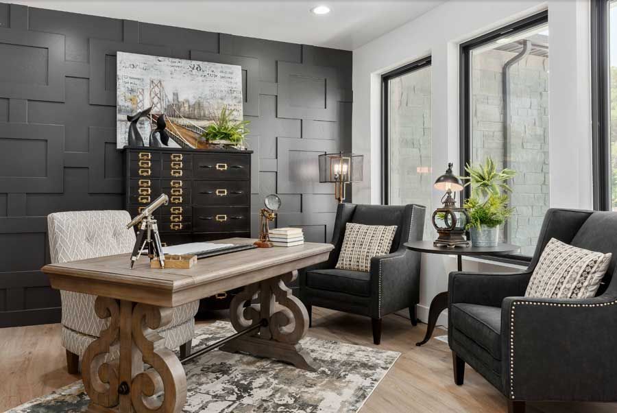 home office with shaped moulding feature wall 