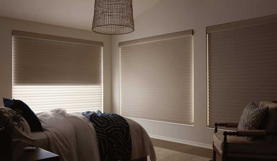 dual sheer shades in bedroom for room darkening light control