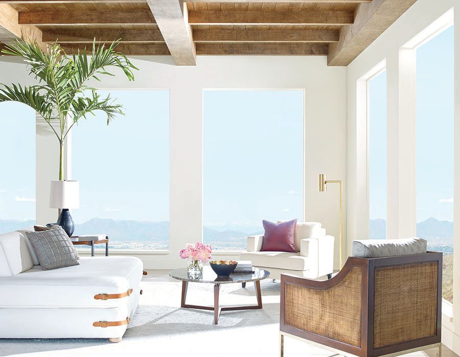 neutral roller shades in hallway of modern home