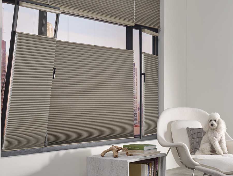 Honeycomb shades in living room with Trackglide