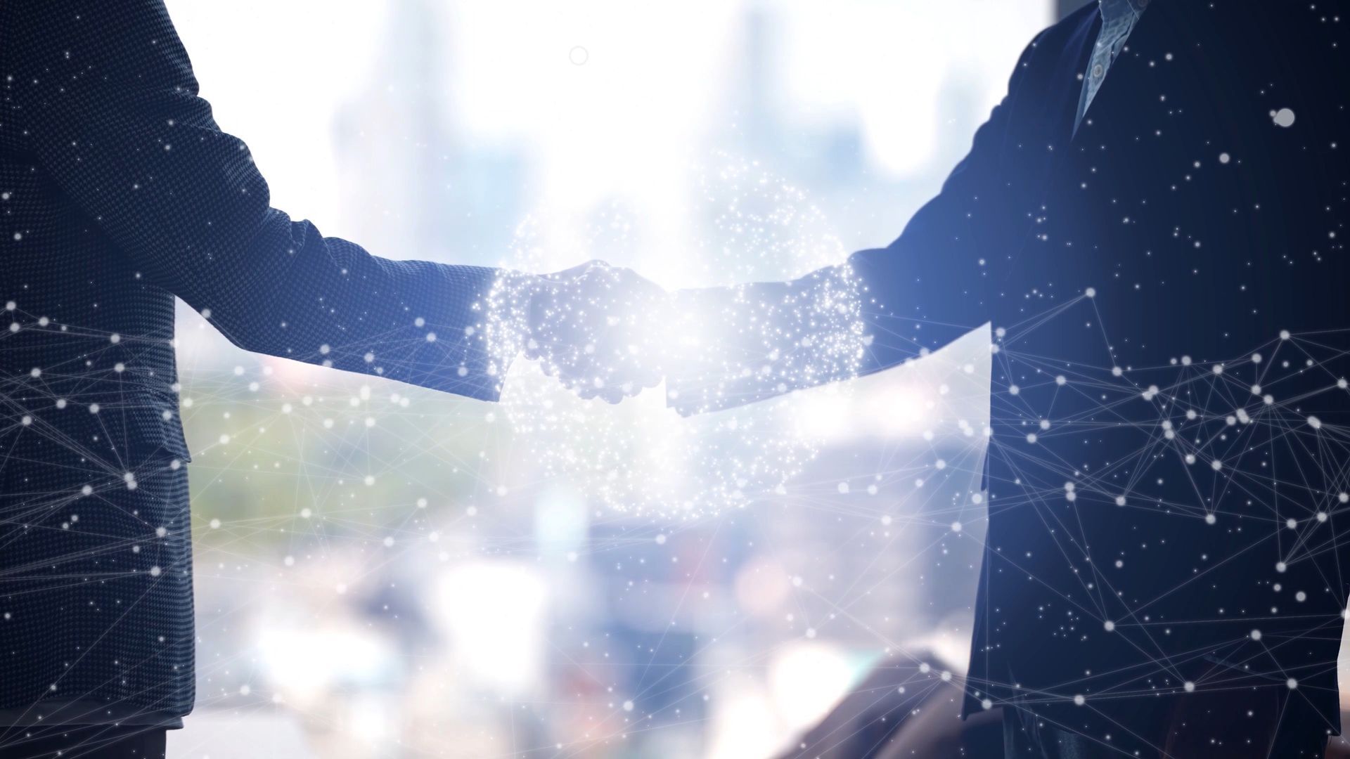 Two people in suits shaking hands, with a network of connected lines and a bright light between them.