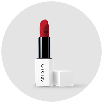 A red lipstick in a white tube on a white background.