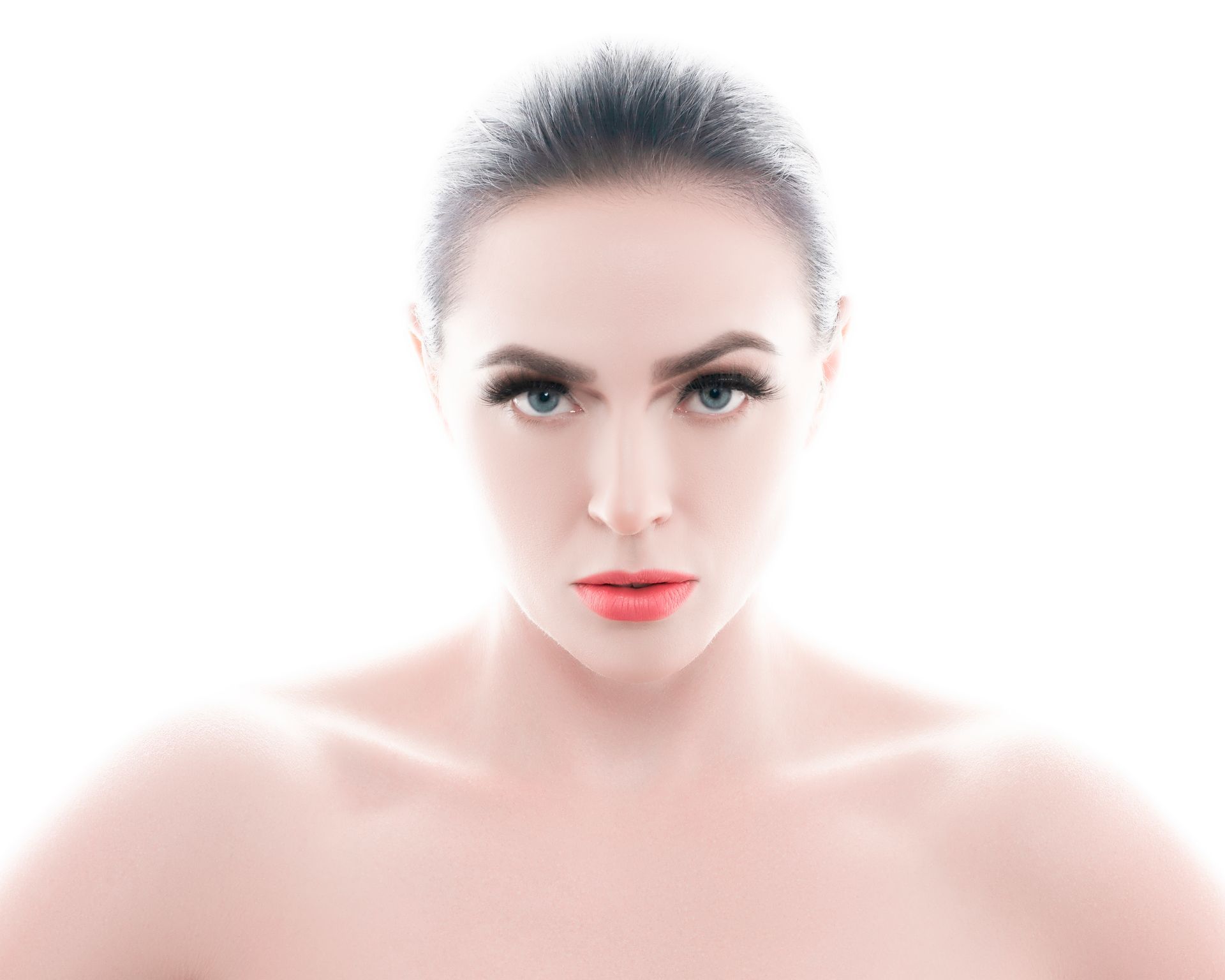 A close up of a woman 's face on a white background.