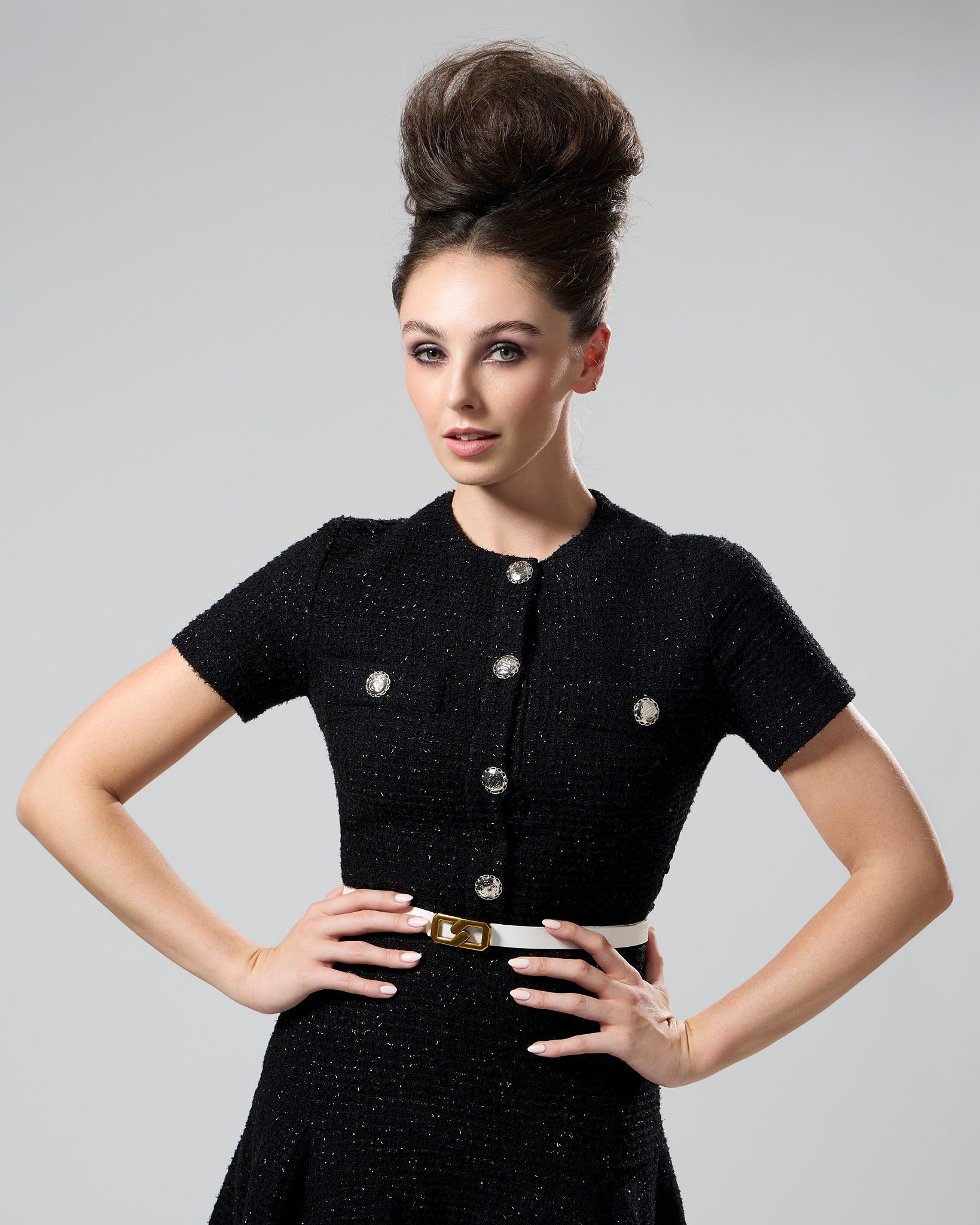 International top model wearing a elegant black dress for NY Fashion week.