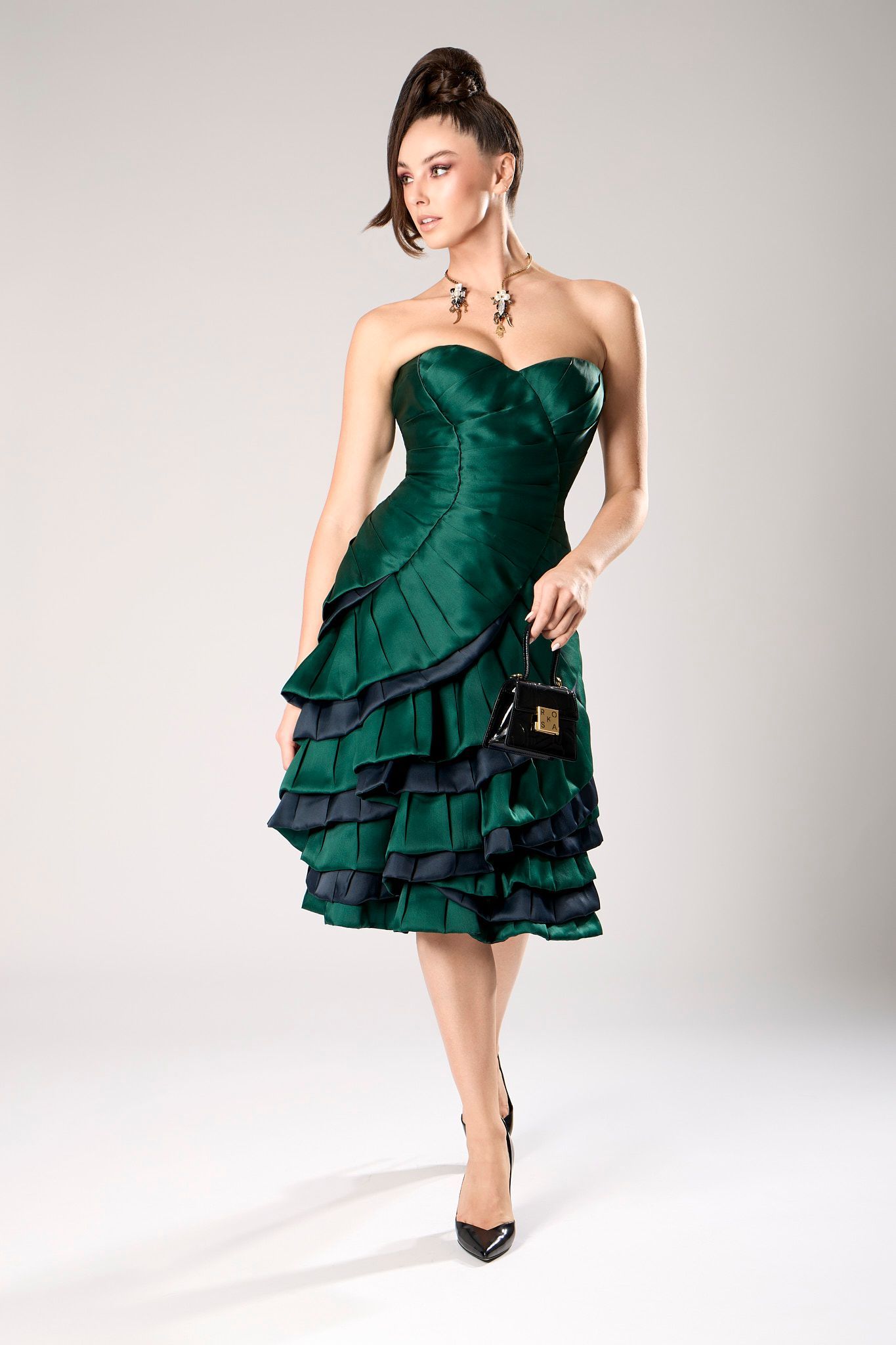 International top model wearing a elegant green strapless  gown for NY Fashion week.