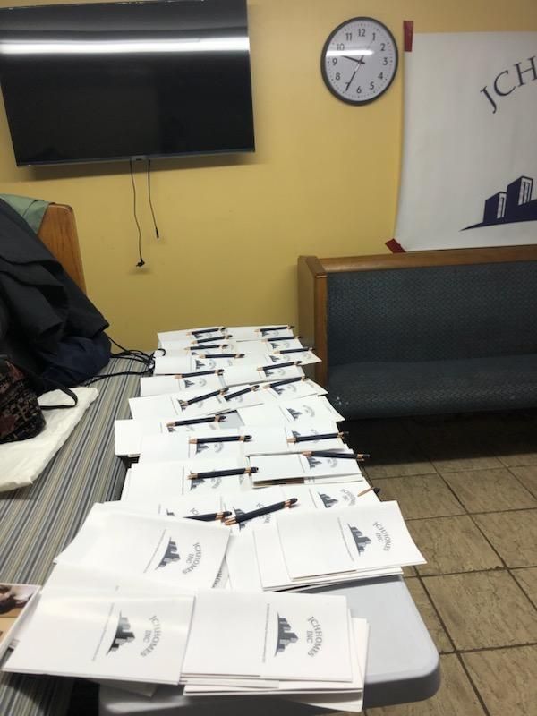 A room with a clock and a sign that says ice