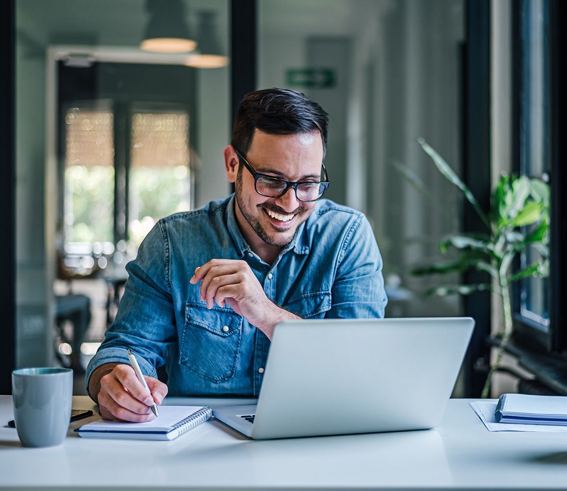 Man Taking Down Notes — Deerfield, IL — Peak Utility Brokers