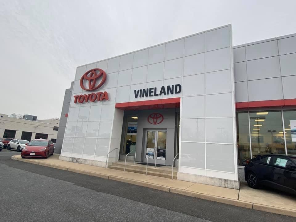 Toyota dealership in Vineland with red and white branding.