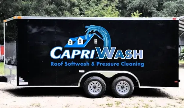 Black trailer with Capri Wash logo for roof and pressure cleaning.