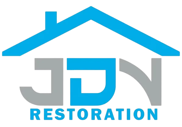 A blue and gray logo for jdn restoration