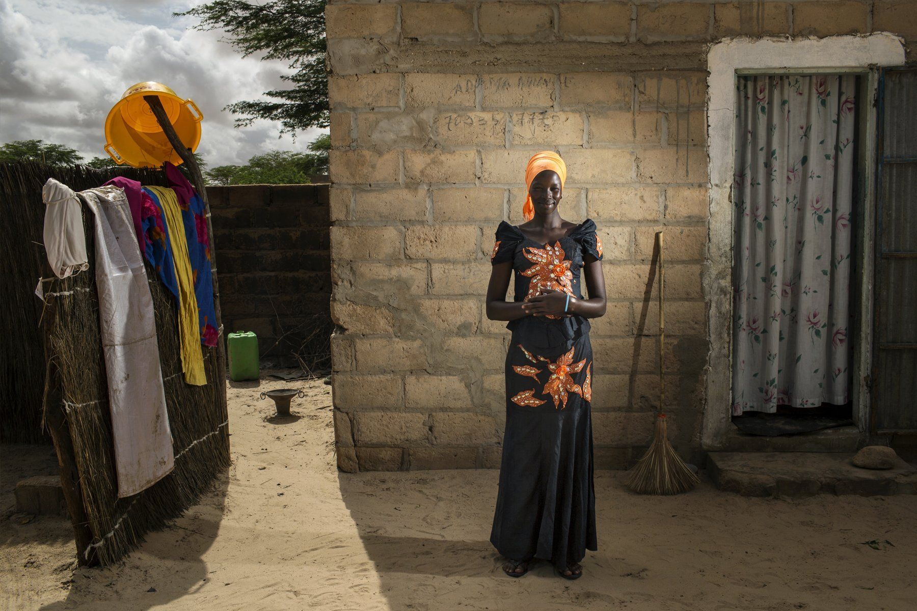 A women in a village working with Millennium Promise