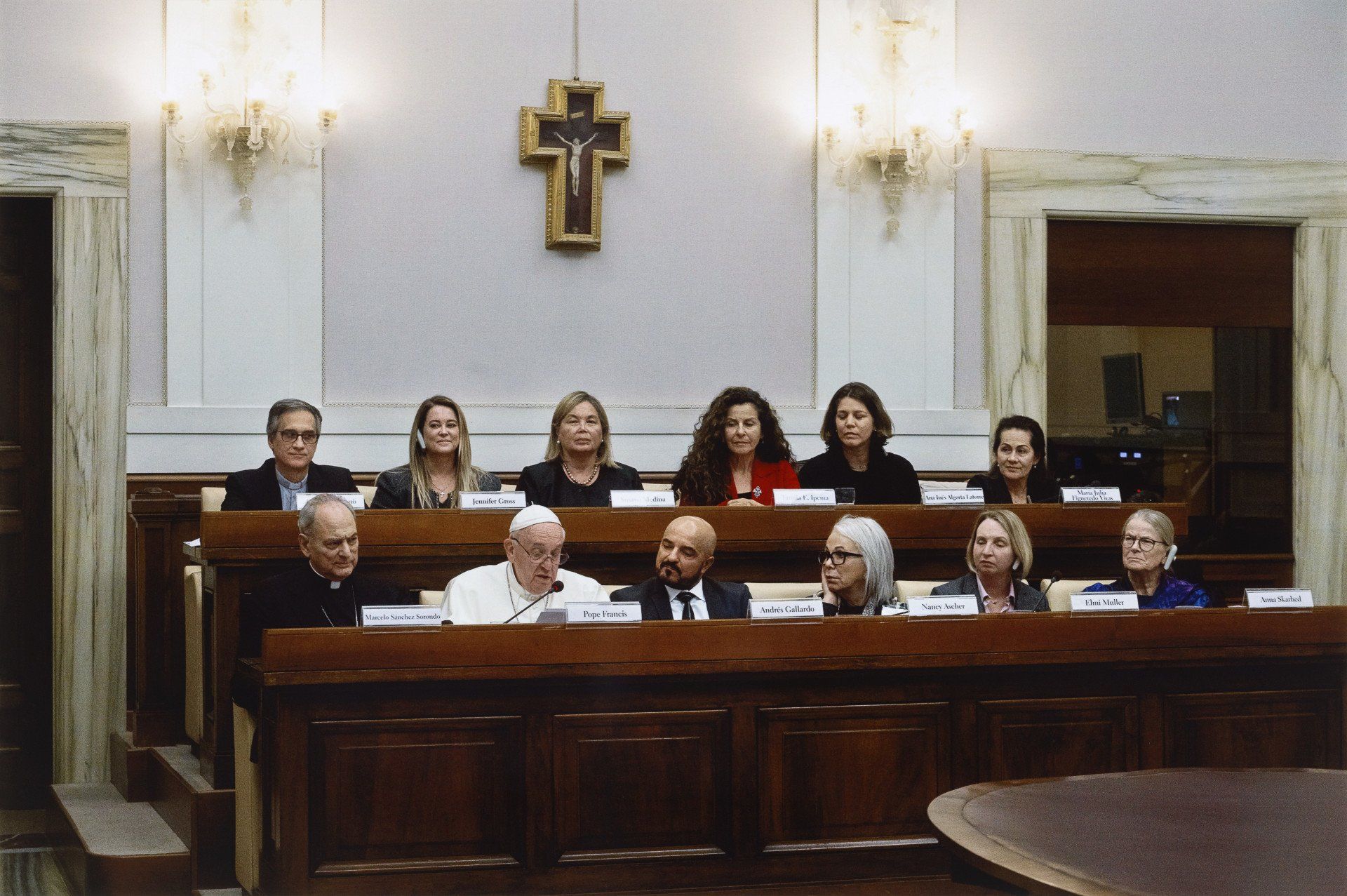 The pope sitting at a Vatican Summit conference