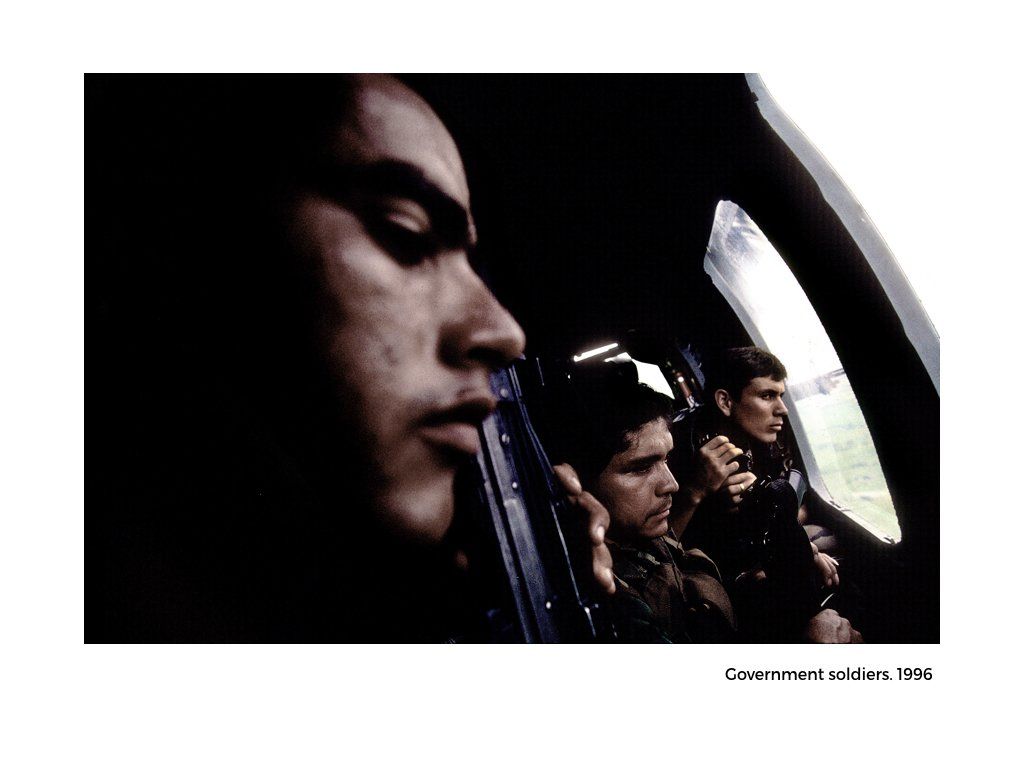 The Peace Project Colombian Government soldiers sitting in a van holding guns