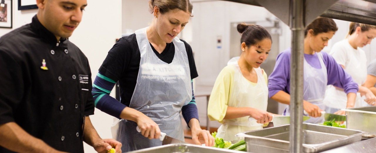 LA Kitchen students learning how to prep vegetables