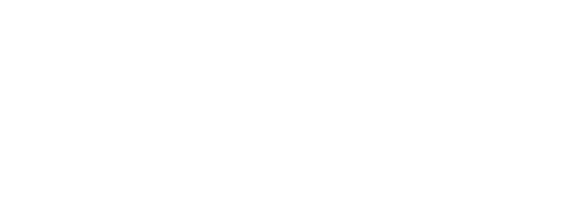 A close-up of a vibrant, multicolored butterfly resting on a green leaf.