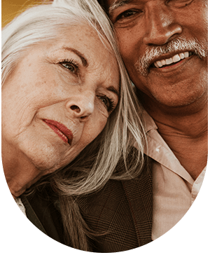 Mixed-ethnicity couple smiling together