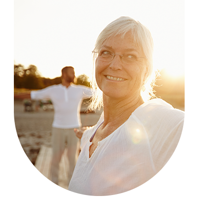 woman smiling after successful gum health treatment at Hampstead Clinic, London, showcasing improved oral hygiene and care