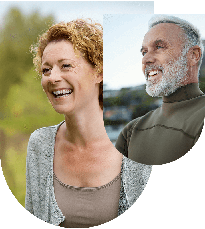 Smiling woman and man, representing enhanced bone health for successful dental implants at Hampstead Clinic