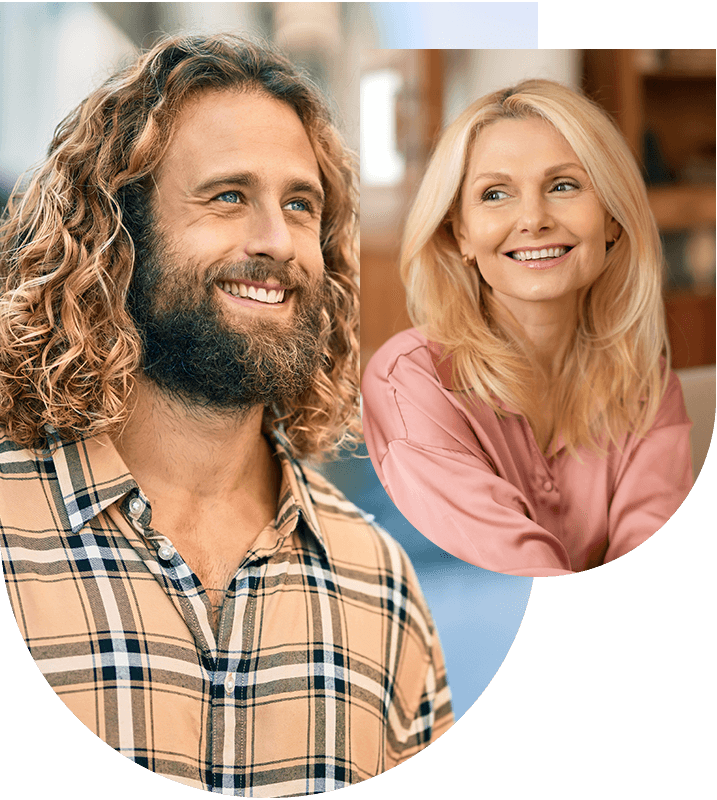 Man and woman with long hair smiling, highlighting results of a smile makeover at Hampstead Clinic