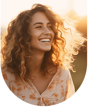 Lady with long hair smiling, showcasing confidence after dental care at Hampstead Clinic